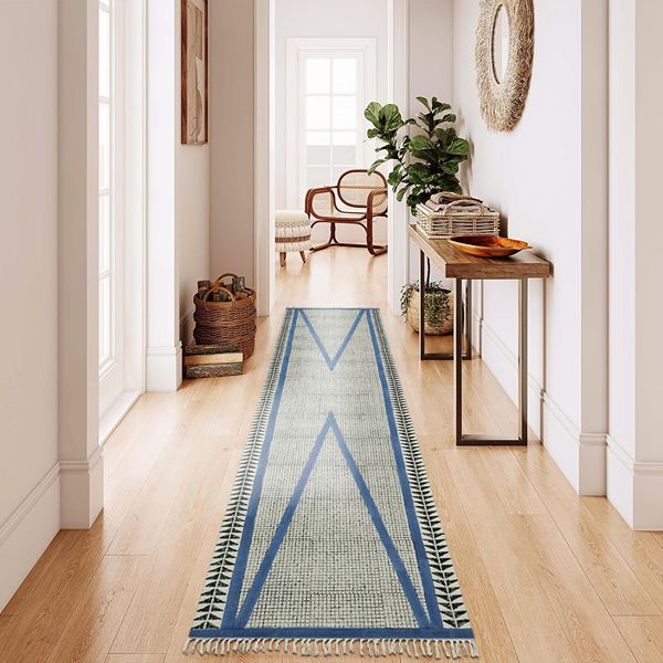Blue geometric rug in entryway