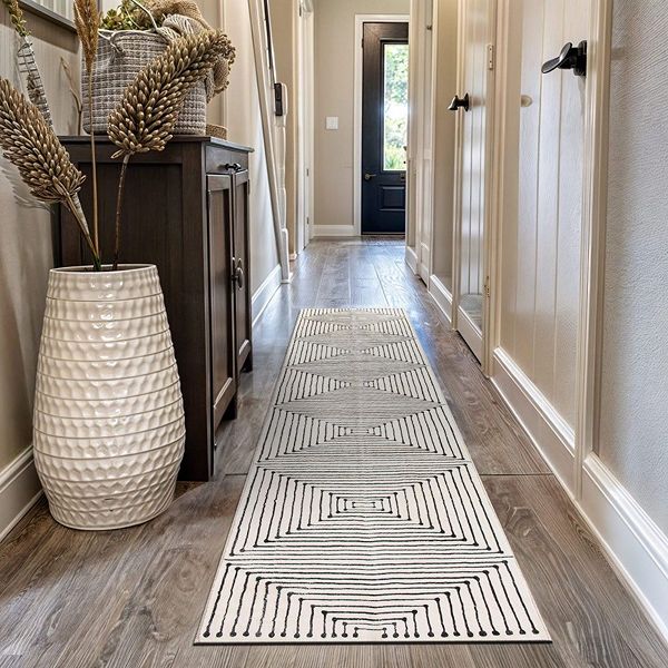 Textured neutral rug beside doorway