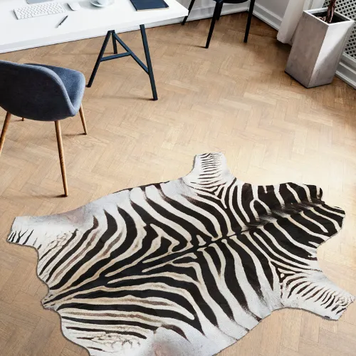 Liska Animal Print Cowhide Rugs in Living Room