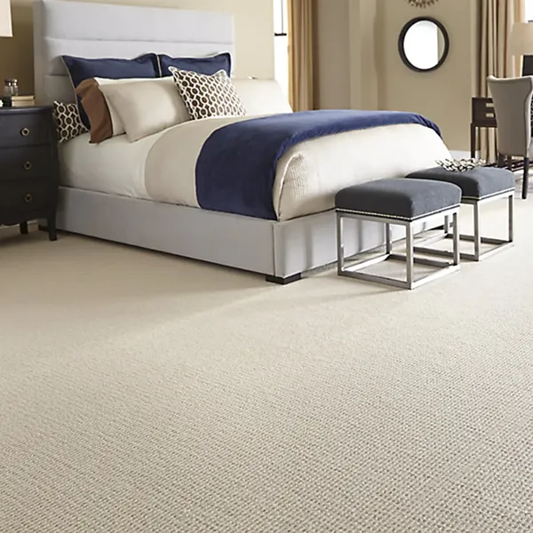 Cream bedroom with beige carpet