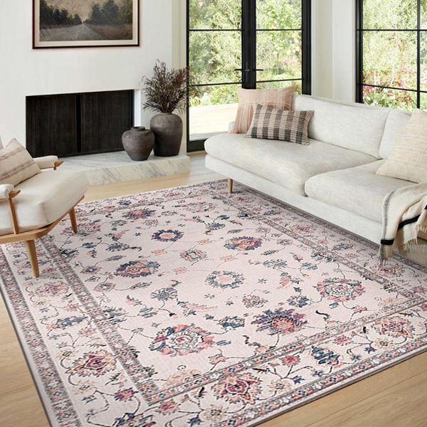 Persian rug with a soft floral pattern in a bright living room